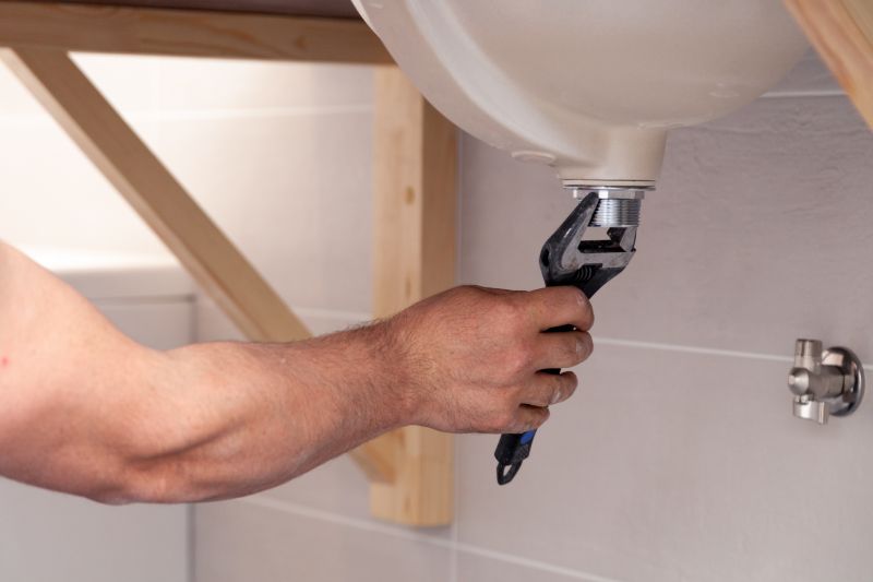 Plumber Installing a Fixture